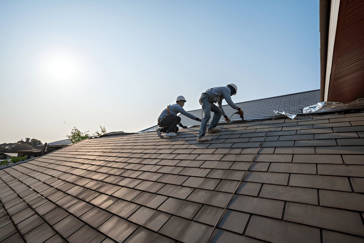 commercial roof inspection team working on roof